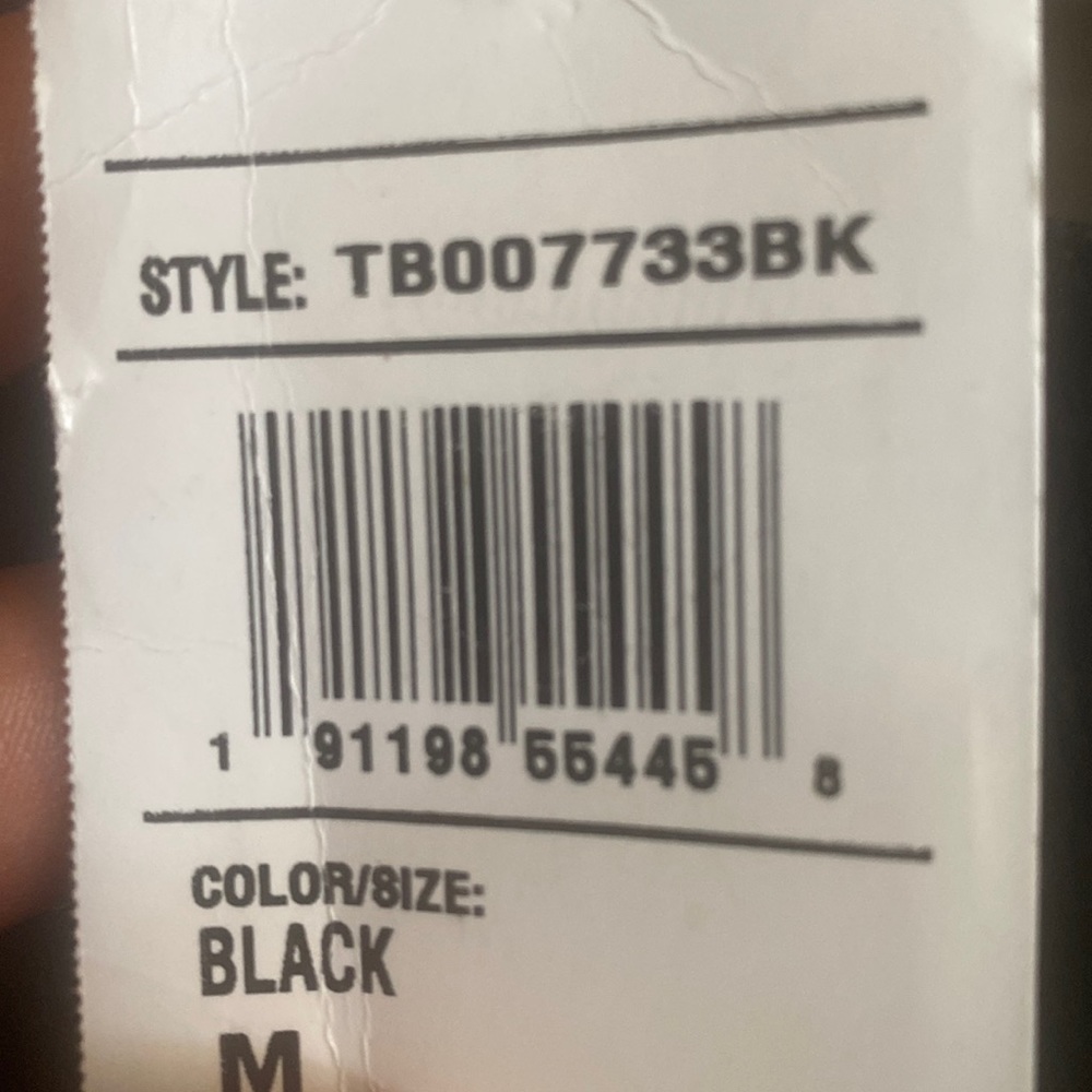 A pair of black overalls (size medium)